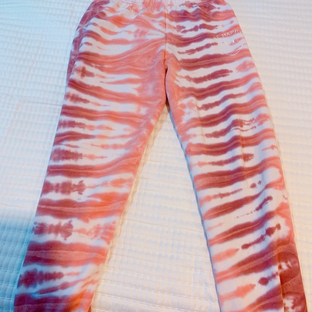 Tie-dye PacSun “be happy” sweatpants
